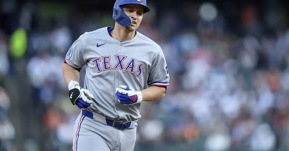 Joc Pederson departs with a fractured right hand in another injury for the Texas Rangers