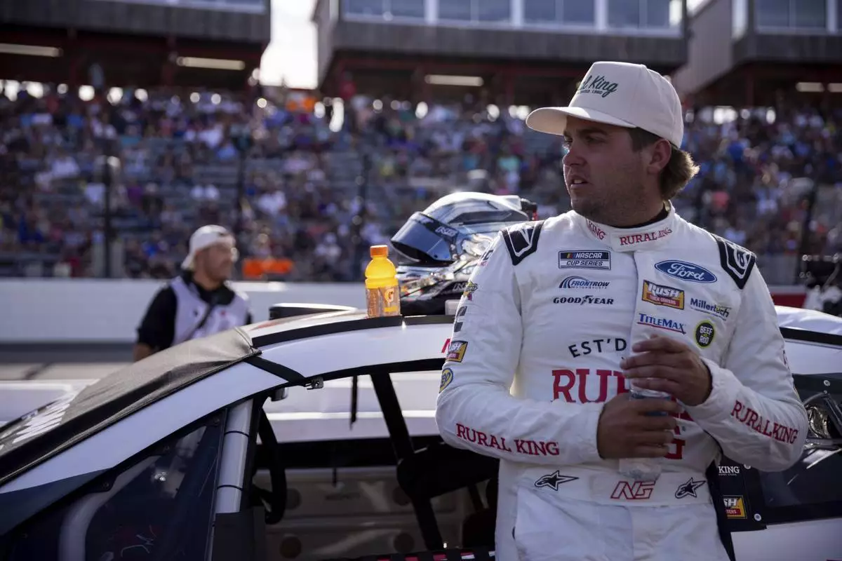 Noah Gragson waits to drive in the NASCAR All-Star Open auto race Sunday, May 18, 2025, in North Wilkesboro, N.C. (AP Photo/Scott Kinser)