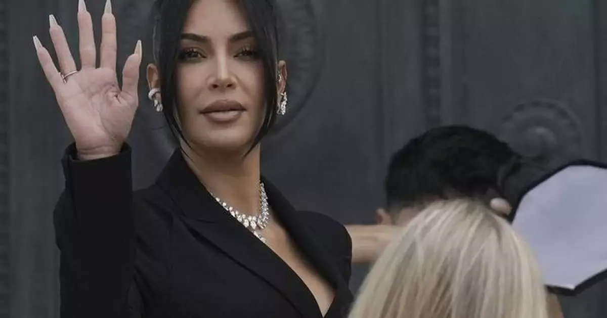 Kim Kardashian dons a graduation cap and marches closer to becoming a lawyer