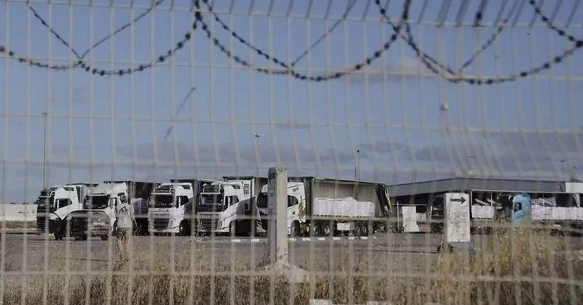 Israeli strikes kill at least 85 in Gaza as Israel allows more aid into Palestinian territory