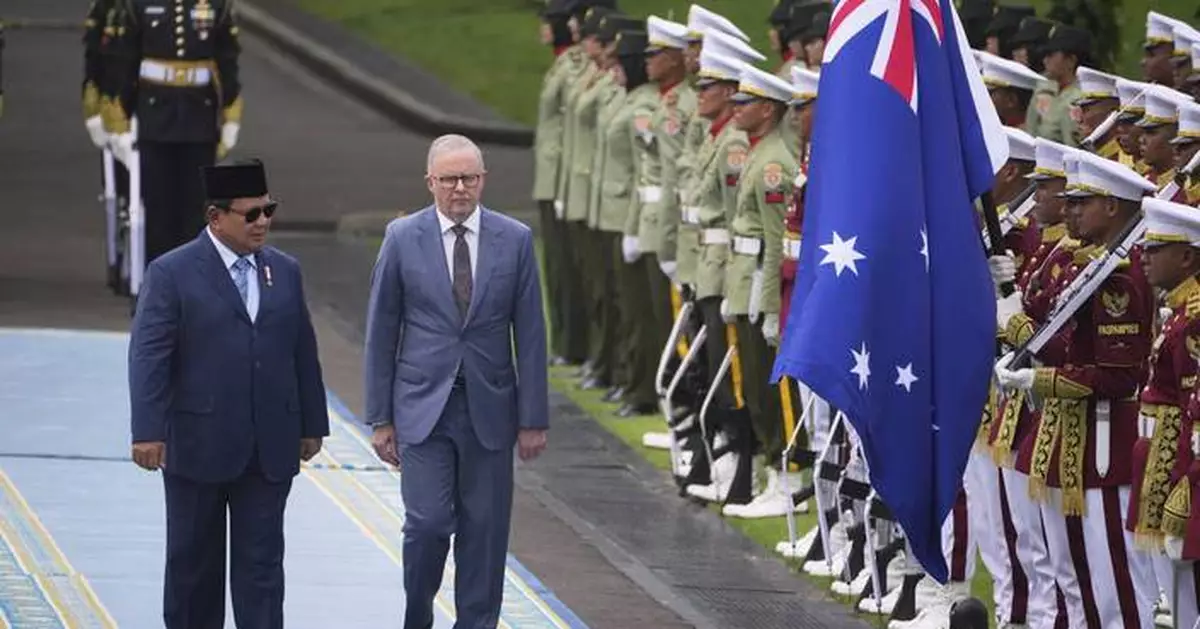 Australian leader visits Indonesia seeking deeper economic and defense ties