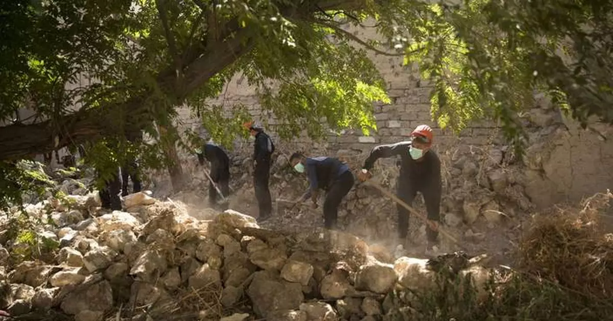 Remains of 30 people believed killed by IS militants found in Syria in a search by Qatar and FBI