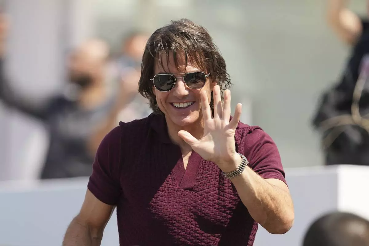 Tom Cruise arrives for the photo call for the film 'Mission: Impossible – The Final Reckoning' at the 78th international film festival, Cannes, southern France, Wednesday, May 14, 2025. (AP Photo/Natacha Pisarenko)