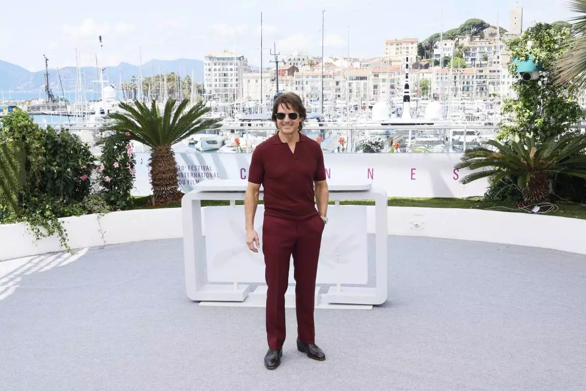 Tom Cruise poses for photographers during the photo call for the film 'Mission: Impossible – The Final Reckoning' at the 78th international film festival, Cannes, southern France, Wednesday, May 14, 2025. (Photo by Joel C Ryan/Invision/AP)