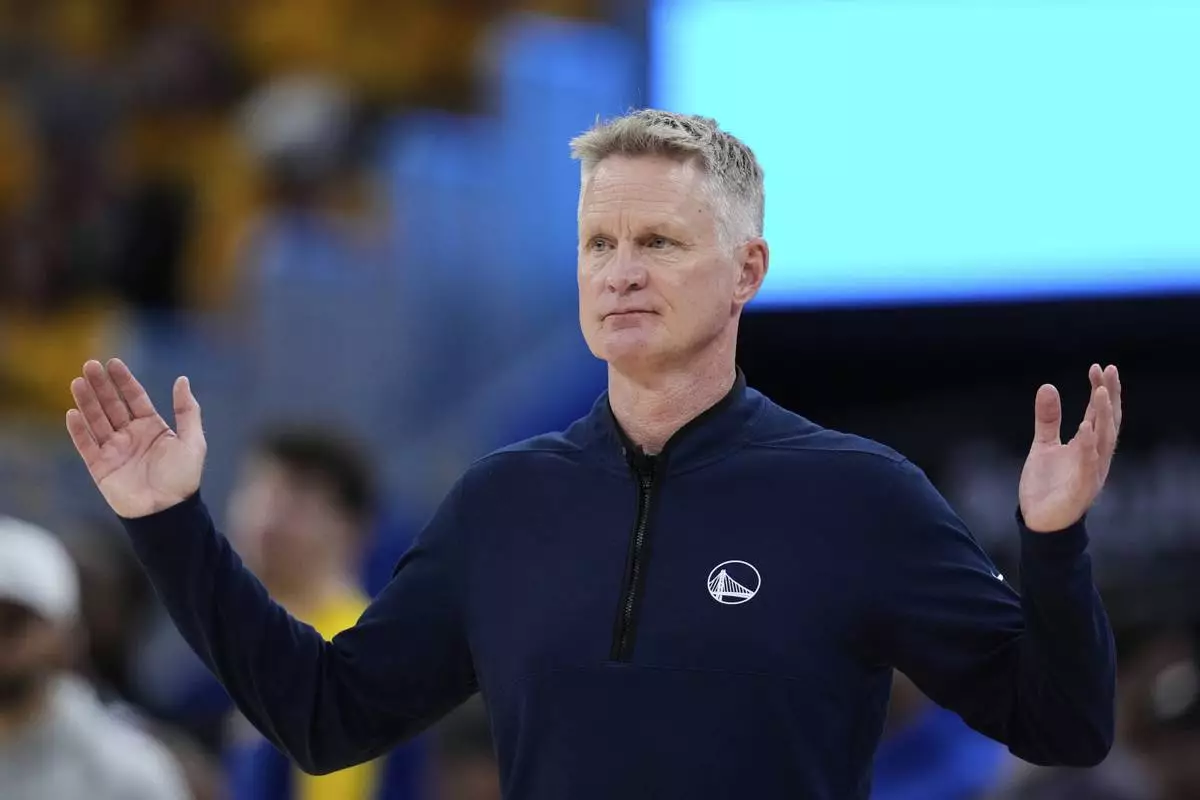 Golden State Warriors head coach Steve Kerr gestures during the first half of Game 3 of an NBA basketball second-round playoff series against the Minnesota Timberwolves, Saturday, May 10, 2025, in San Francisco. (AP Photo/Godofredo A. Vásquez)