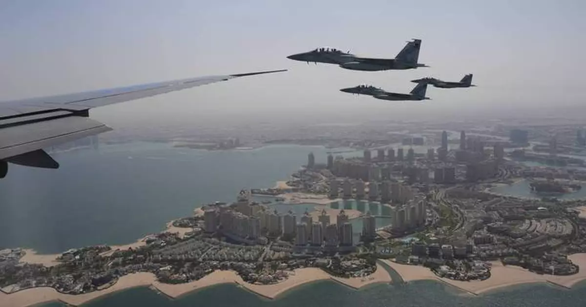 Trump's Qatar trip is off to a flying start as Air Force One gets another fighter jet escort