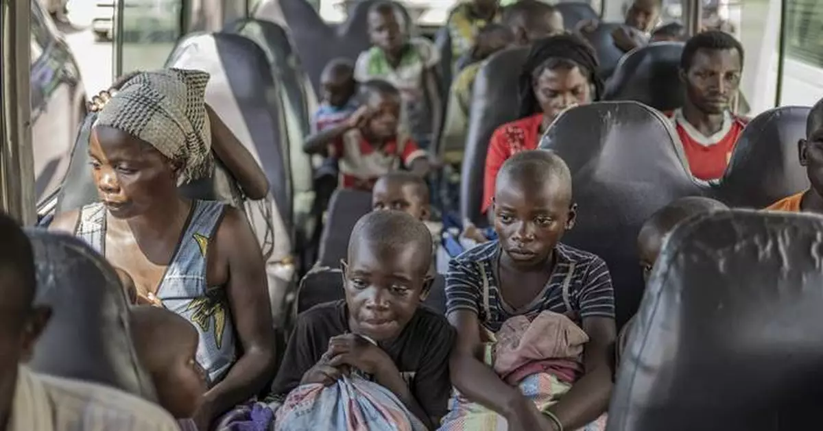 Hundreds of Rwandans who fled to Congo after the 1994 genocide return in UN repatriation