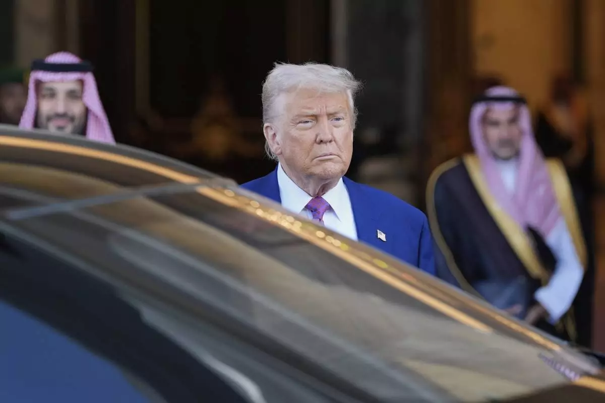 President Donald Trump looks on as he leaves the Royal Palace after a signing ceremony with Saudi Crown Prince Mohammed bin Salman in Riyadh, Saudi Arabia, Tuesday, May 13, 2025. (AP Photo/Alex Brandon)