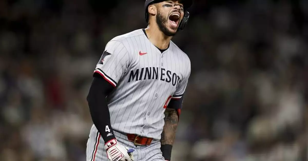 Correa hits a 2-run homer in the 10th in the Twins' 12-6 comeback victory over the Mariners