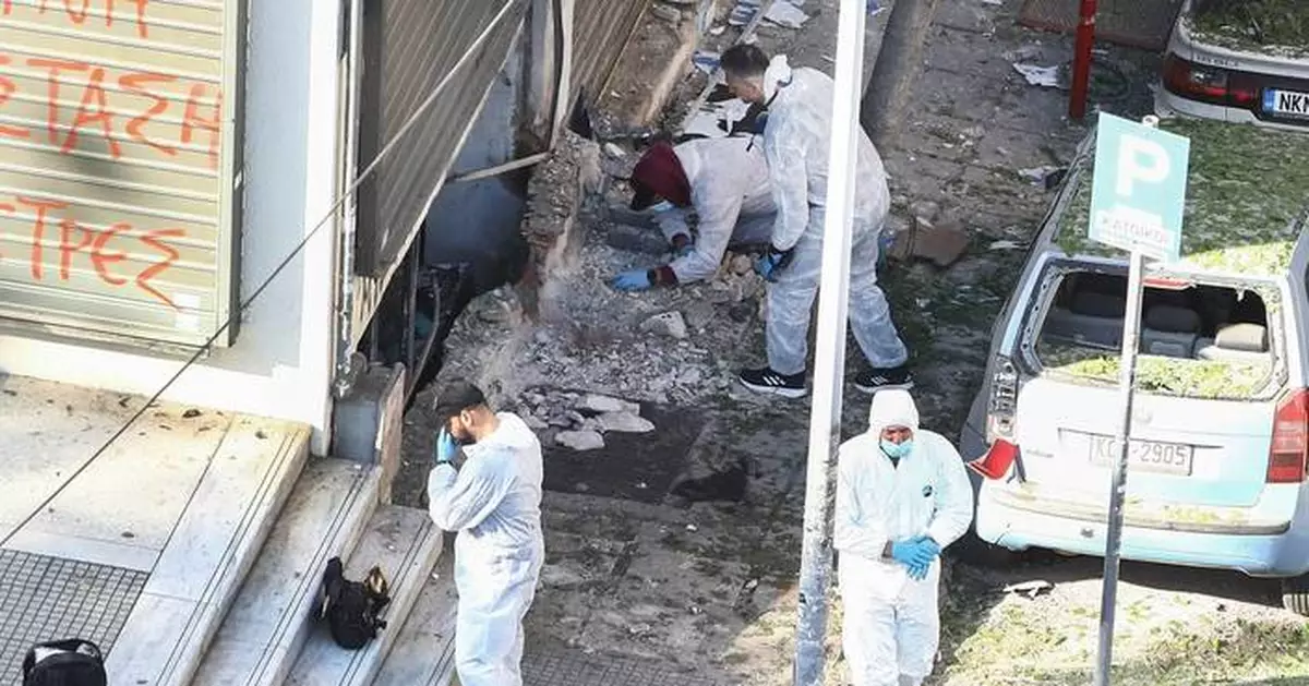 Woman dies when a bomb she is carrying explodes in the Greek city of Thessaloniki, police say