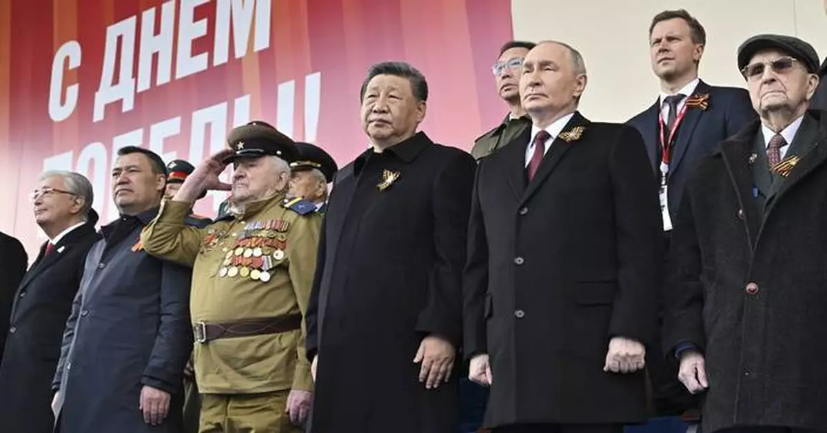 The Latest: Russia-West rift at forefront of celebrations for victory over Nazis
