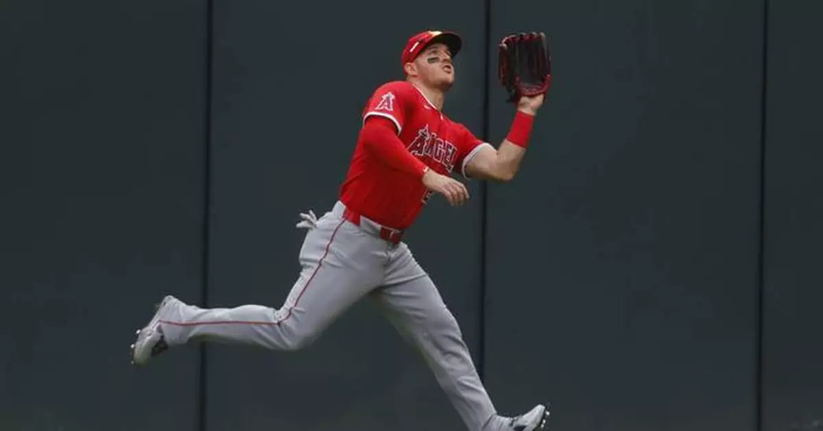 Angels star Mike Trout leaves game with left knee soreness after trying to leg out a grounder