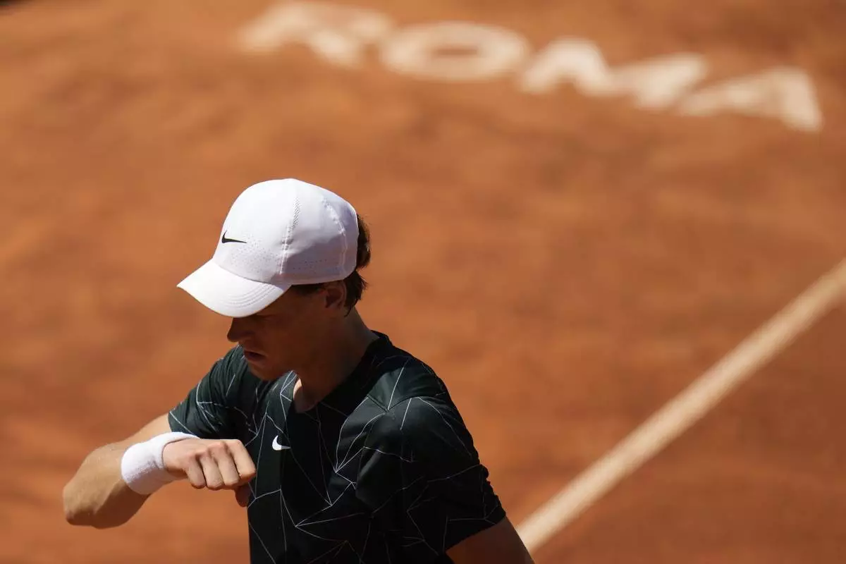 FILE - Italy's Jannik Sinner reacts after losing a point during his match against Greece's Stefanos Tsitsipas at the Italian Open tennis tournament, in Rome, May 13, 2022. (AP Photo/Alessandra Tarantino, File)