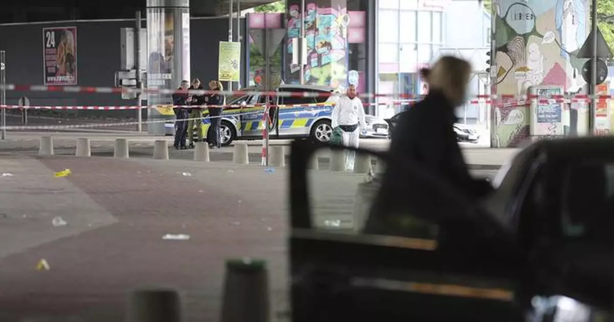 German police search for a man who attacked and injured at least 5 people outside a bar