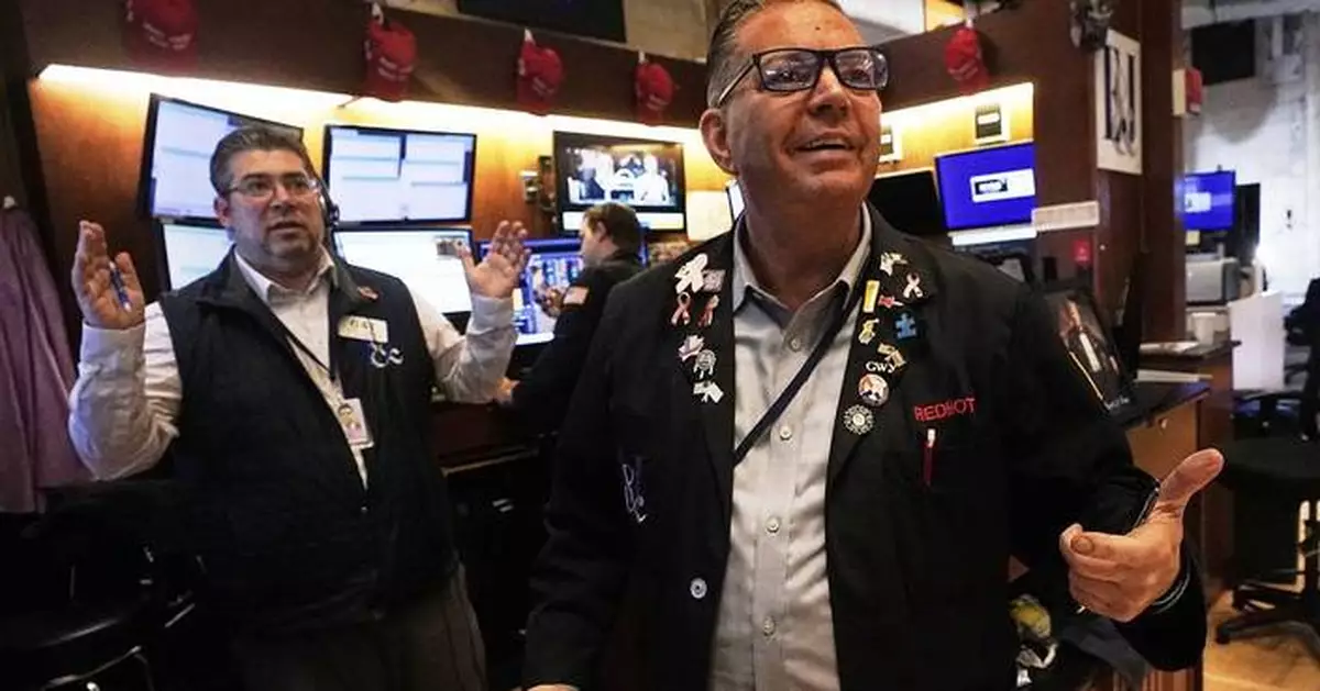 US stocks power within 3% of their record as Wall Street closes out a winning week