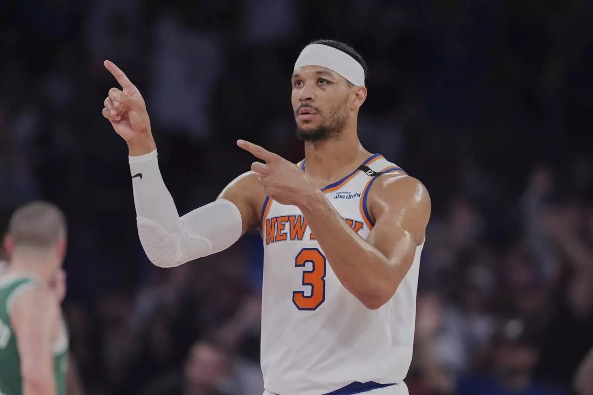 New York Knicks' Josh Hart (3) gestures after Boston Celtics' Jaylen Brown (7) fouls out during the second half of Game 6 in the Eastern Conference semifinals of the NBA basketball playoffs Friday, May 16, 2025, in New York. (AP Photo/Frank Franklin II)