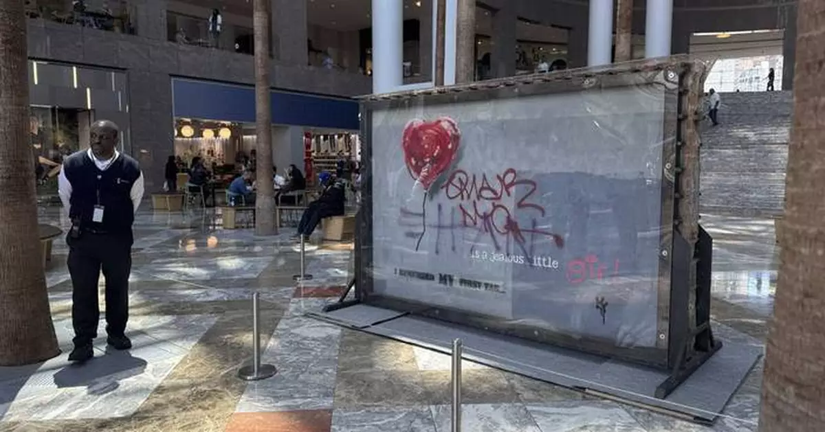 Banksy's ‘Broken Heart' painting defaced on a Brooklyn wall is up for sale