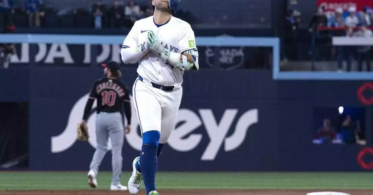 Schneemann's grand slam with 2 out in the 9th inning rallies Guardians to 5-3 win over Blue Jays