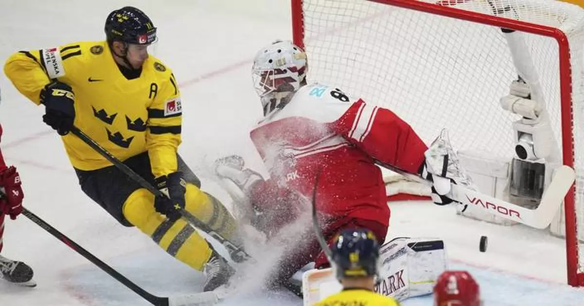 US wins 1st world hockey title since 1933 with 1-0 OT victory over Switzerland