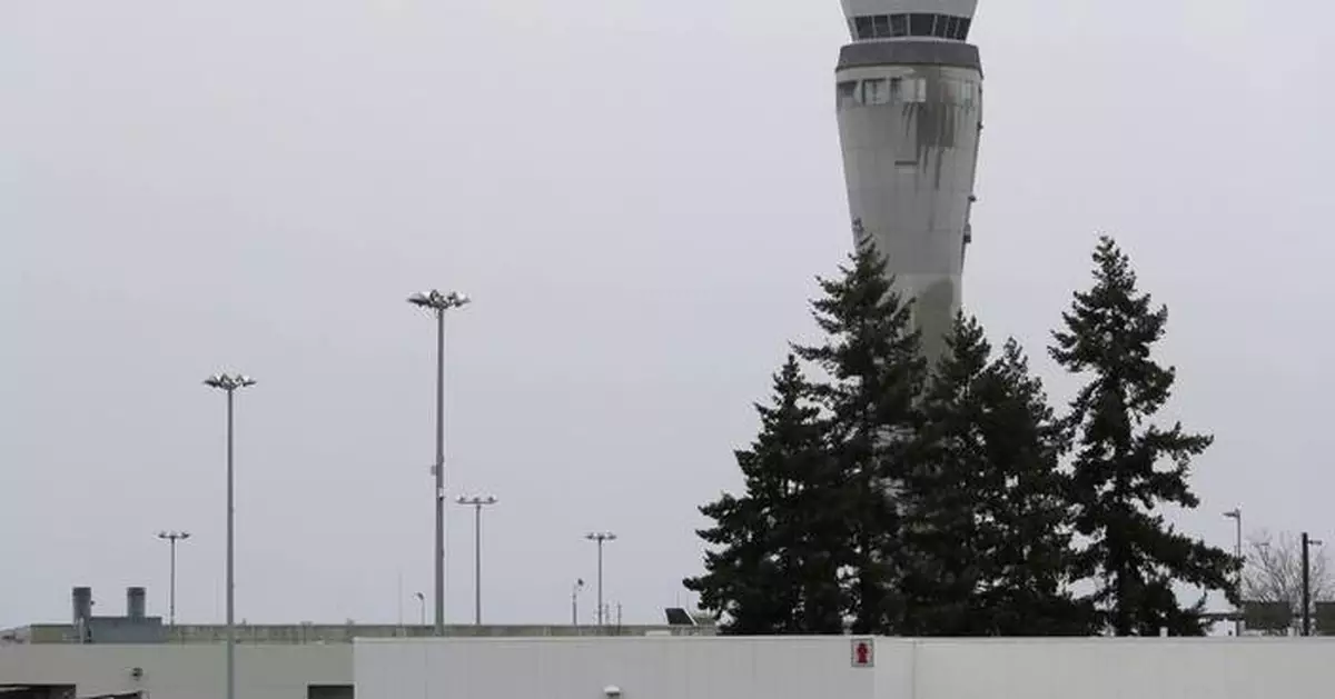 Police search for fugitive who escaped from Seattle's airport in handcuffs