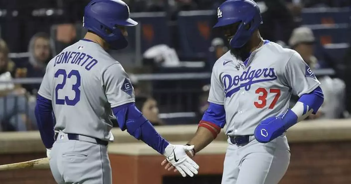 Hernández sends Dodgers past Mets 7-5 in 13 innings in wild and rainy NLCS rematch