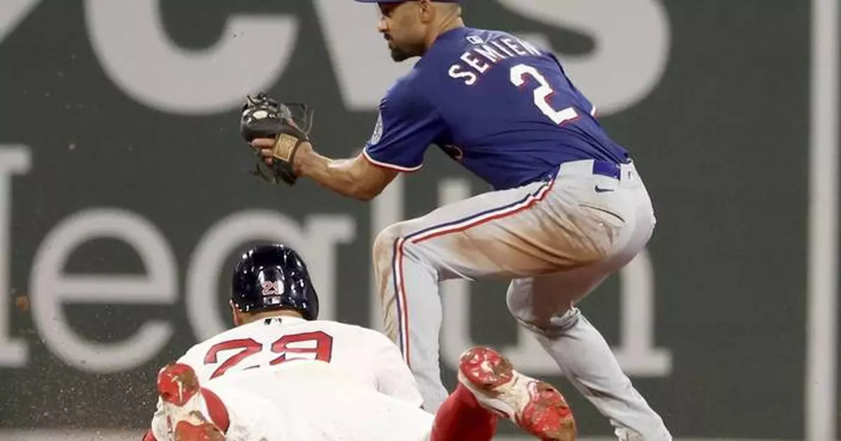 Rangers' bats come alive with new coach Boone in dugout