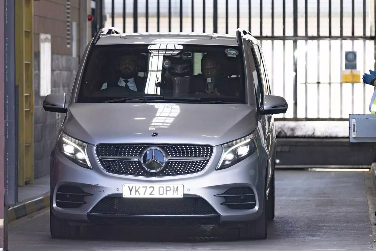 A vehicle believed to be carrying R&B singer Chris Brown leaves HMP Forest Bank in Salford, England, after he was freed on bail, Wednesday May 21, 2025. (James Speakman/PA via AP)