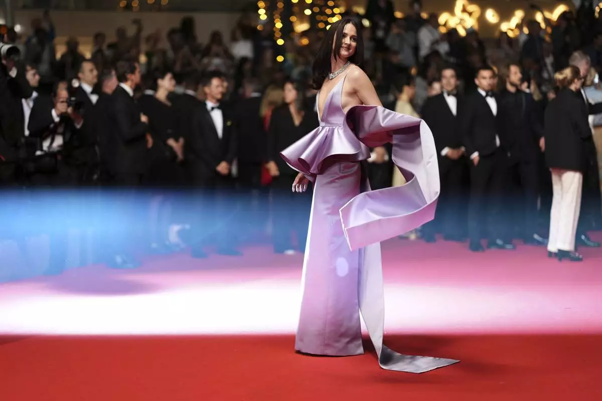 Renate Reinsve poses for photographers upon departure from the premiere of the film 'Sentimental Value' at the 78th international film festival, Cannes, southern France, Wednesday, May 21, 2025. (Photo by Scott A Garfitt/Invision/AP)