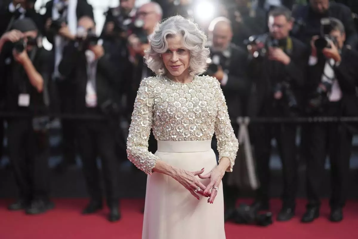 Jane Fonda poses for photographers during the awards ceremony red carpet at the 78th international film festival, Cannes, southern France, Saturday, May 24, 2025. (AP Photo/Natacha Pisarenko)