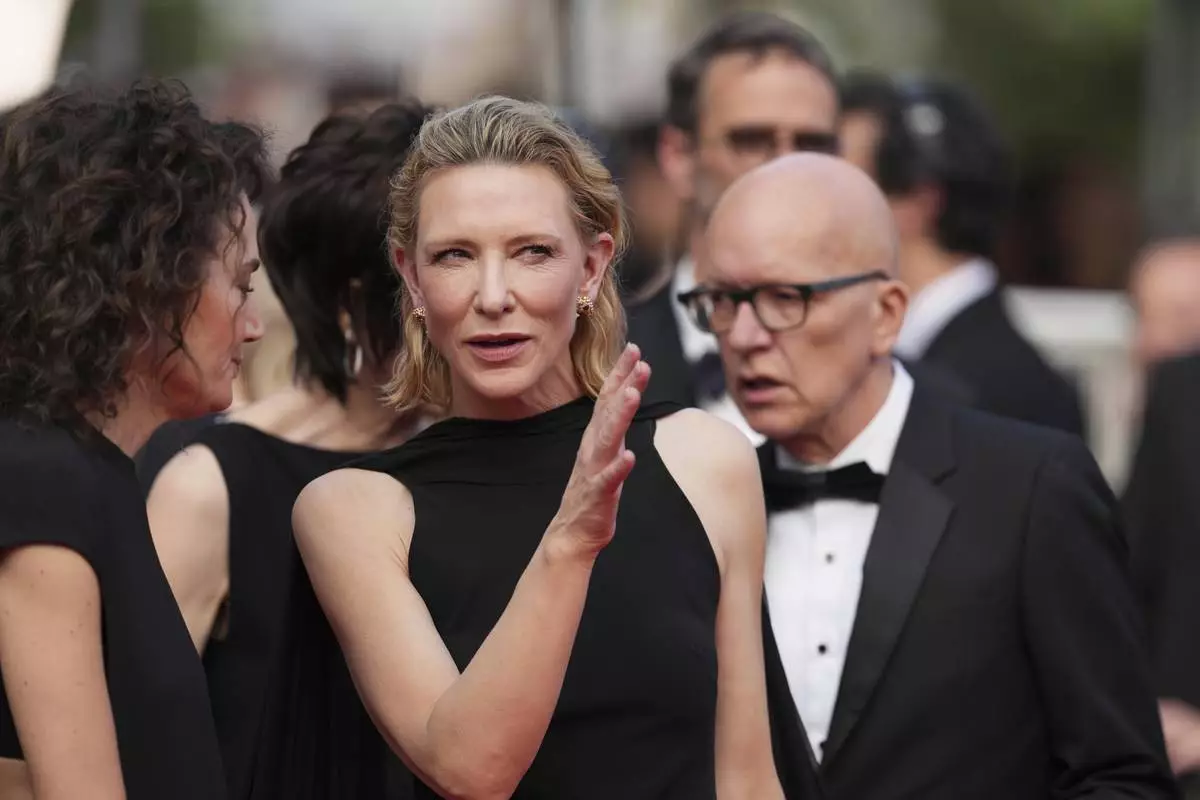 Cate Blanchett poses for photographers during the awards ceremony red carpet at the 78th international film festival, Cannes, southern France, Saturday, May 24, 2025. (AP Photo/Natacha Pisarenko)