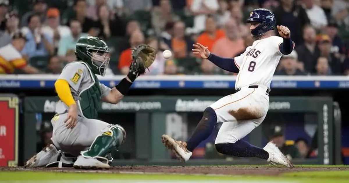 Astros rally in 7th inning to defeat Athletics