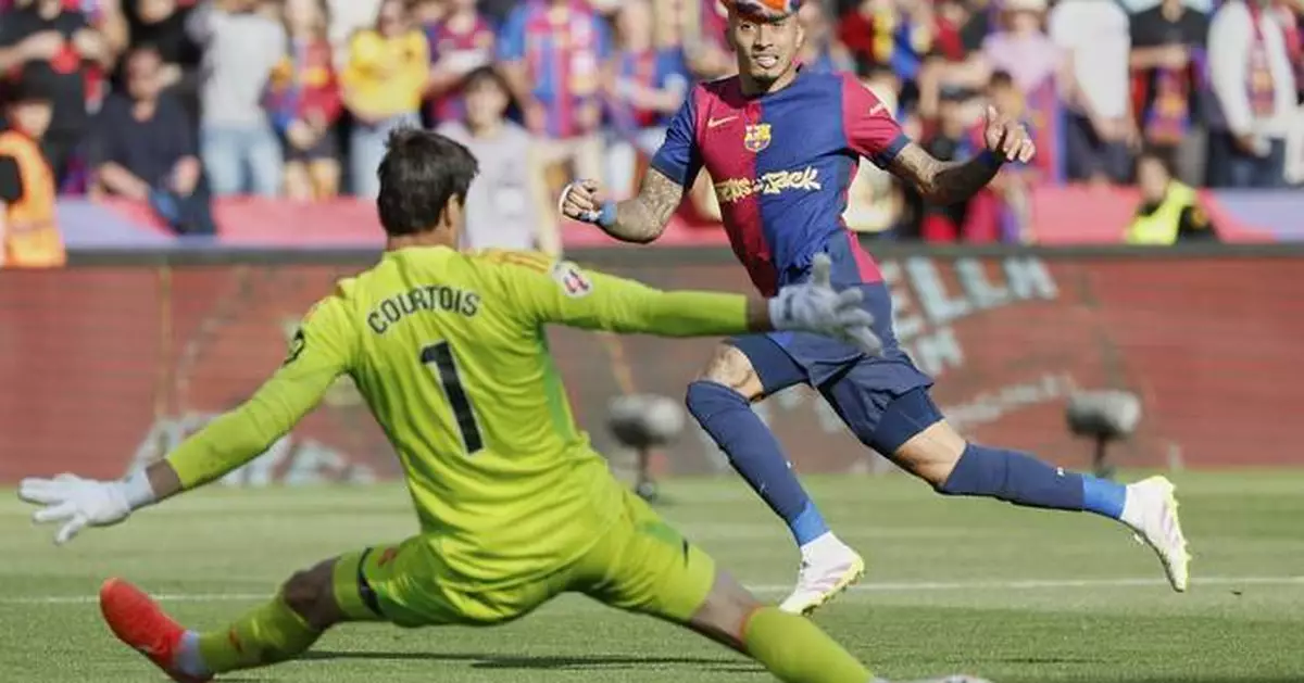 Raphinha's breakthrough season key for Barcelona as it nears Spanish league title