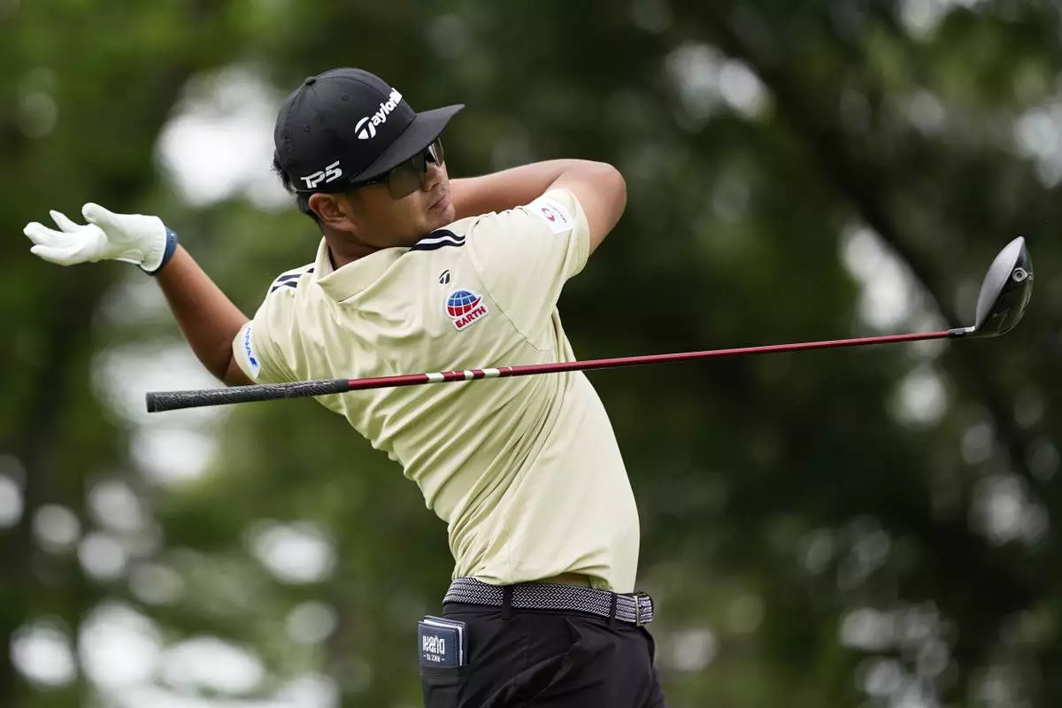 Ryo Hisatsune, of Japan, watches his tee shot on the fifth hole during the second round of the PGA Championship golf tournament at the Quail Hollow Club, Friday, May 16, 2025, in Charlotte, N.C. (AP Photo/David J. Phillip)