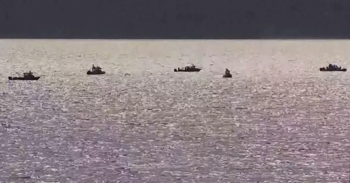 1 person was rescued and a search is underway for 3 others after a boat sinks north of Seattle