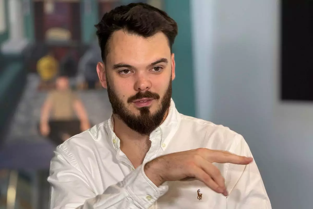 Andrei Kozlov, an artist who was taken hostage by Hamas during the Oct. 7, 2023, attack on Israel, speaks with The Associated Press during an interview Monday, May 19, 2025, at his studio in New York.