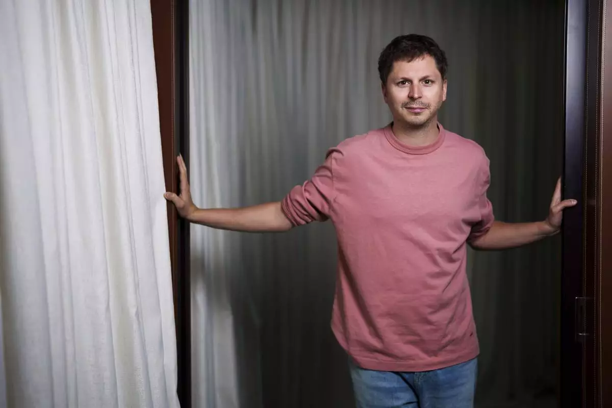 Michael Cera, from the film 'The Phoenician Scheme' poses during the 78th international film festival, Cannes, southern France on Sunday, May 18, 2025. (Photo by Scott A Garfitt/Invision/AP)