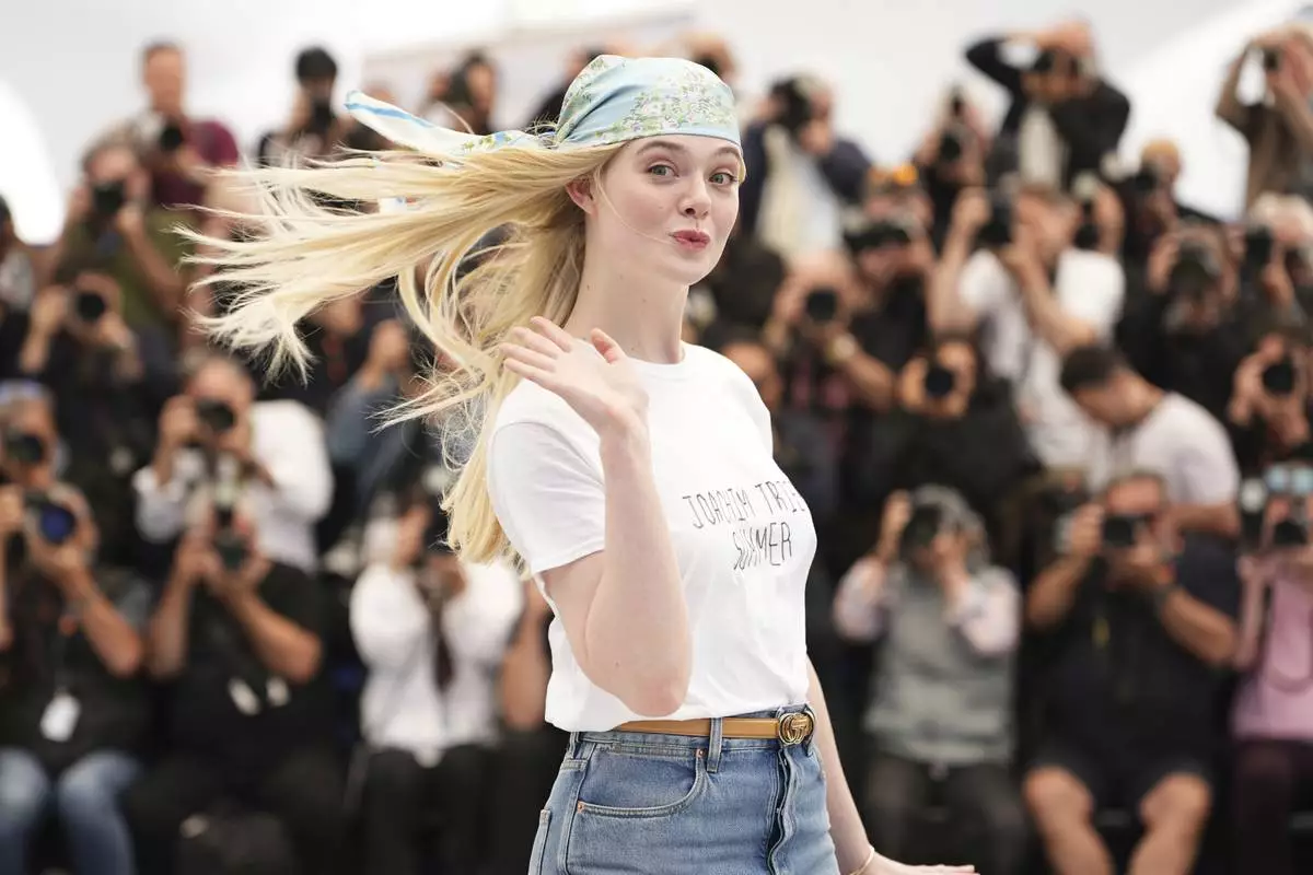 Elle Fanning poses for photographers at the photo call for the film 'Sentimental Value' at the 78th international film festival, Cannes, southern France, Thursday, May 22, 2025. (Photo by Scott A Garfitt/Invision/AP)