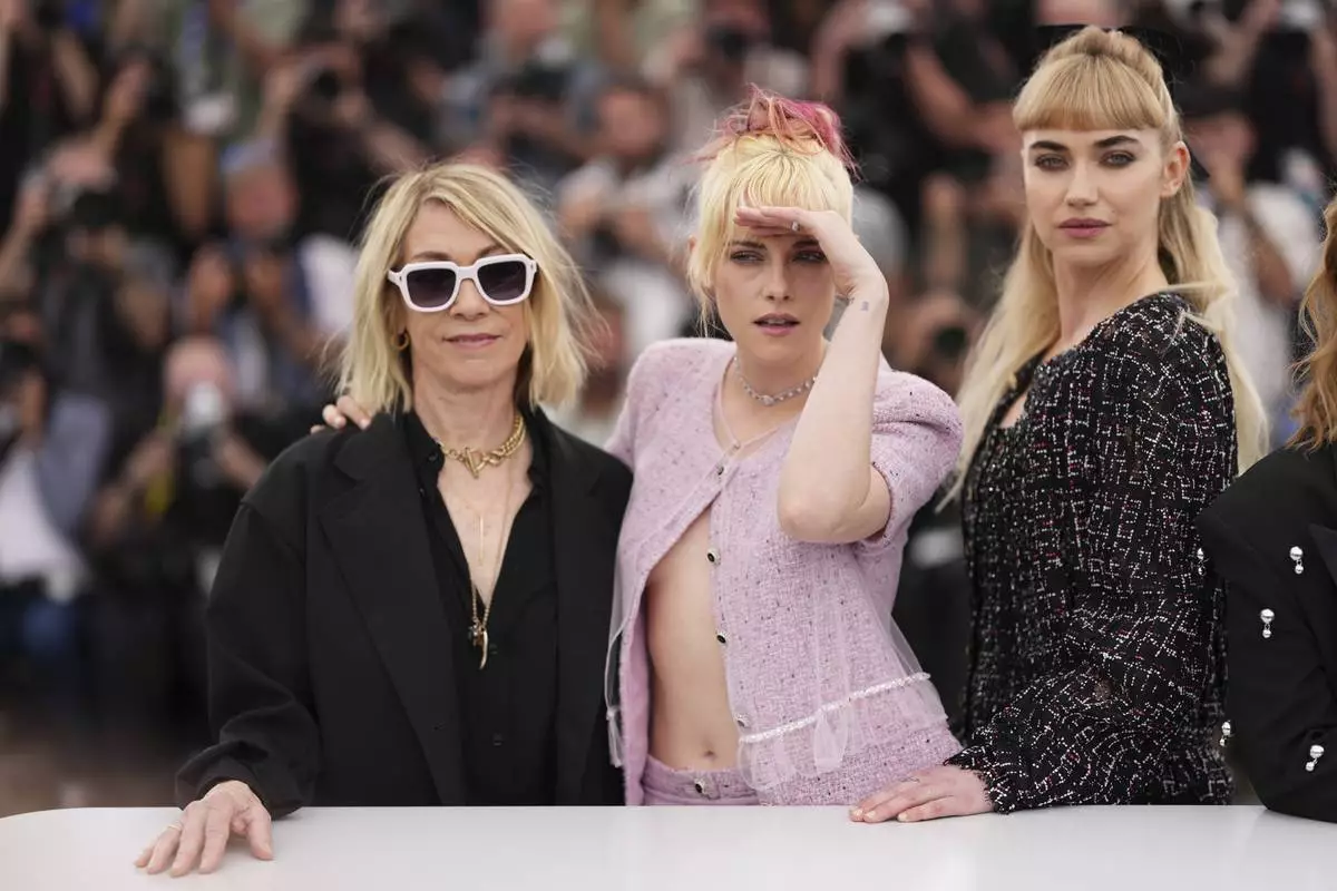 Thora Birch, from left, director Kristen Stewart, and Imogen Poots pose for photographers at the photo call for the film 'The Chronology of Water' at the 78th international film festival, Cannes, southern France, Friday, May 16, 2025. (Photo by Scott A Garfitt/Invision/AP)