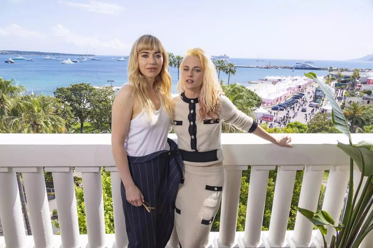 Kristen Stewart, left, and Imogen Poots pose for portrait photographs for the film 'The Chronology of Water' at the 78th international film festival, Cannes, southern France, Saturday, May 17, 2025. (Photo by Joel C Ryan/Invision/AP)
