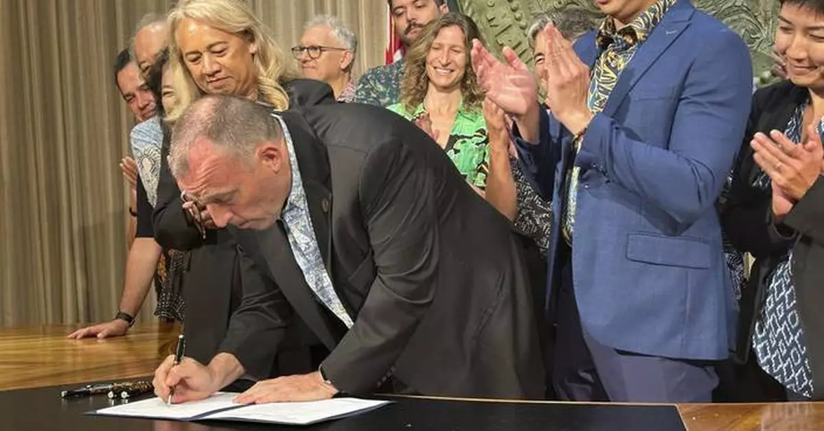 Hawaii's governor signs new hotel tax legislation to help cope with climate change