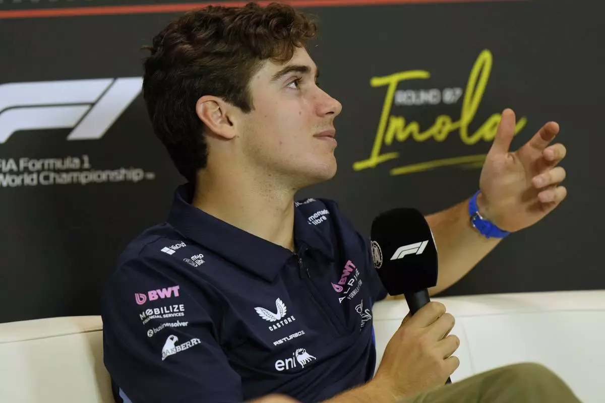 Alpine driver Franco Colapinto of Argentina answers reporters during a news conference at the Enzo and Dino Ferrari racetrack, ahead the Italy's Emilia Romagna Formula One Grand Prix in Imola, Italy, Thursday, May 15, 2025. (AP Photo/Luca Bruno)