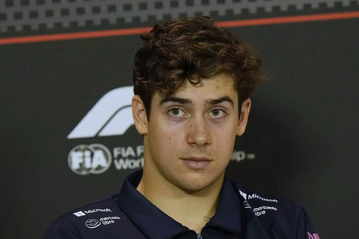 Alpine driver Franco Colapinto of Argentina answers reporters during a news conference at the Enzo and Dino Ferrari racetrack, ahead the Italy's Emilia Romagna Formula One Grand Prix in Imola, Italy, Thursday, May 15, 2025. (AP Photo/Luca Bruno)