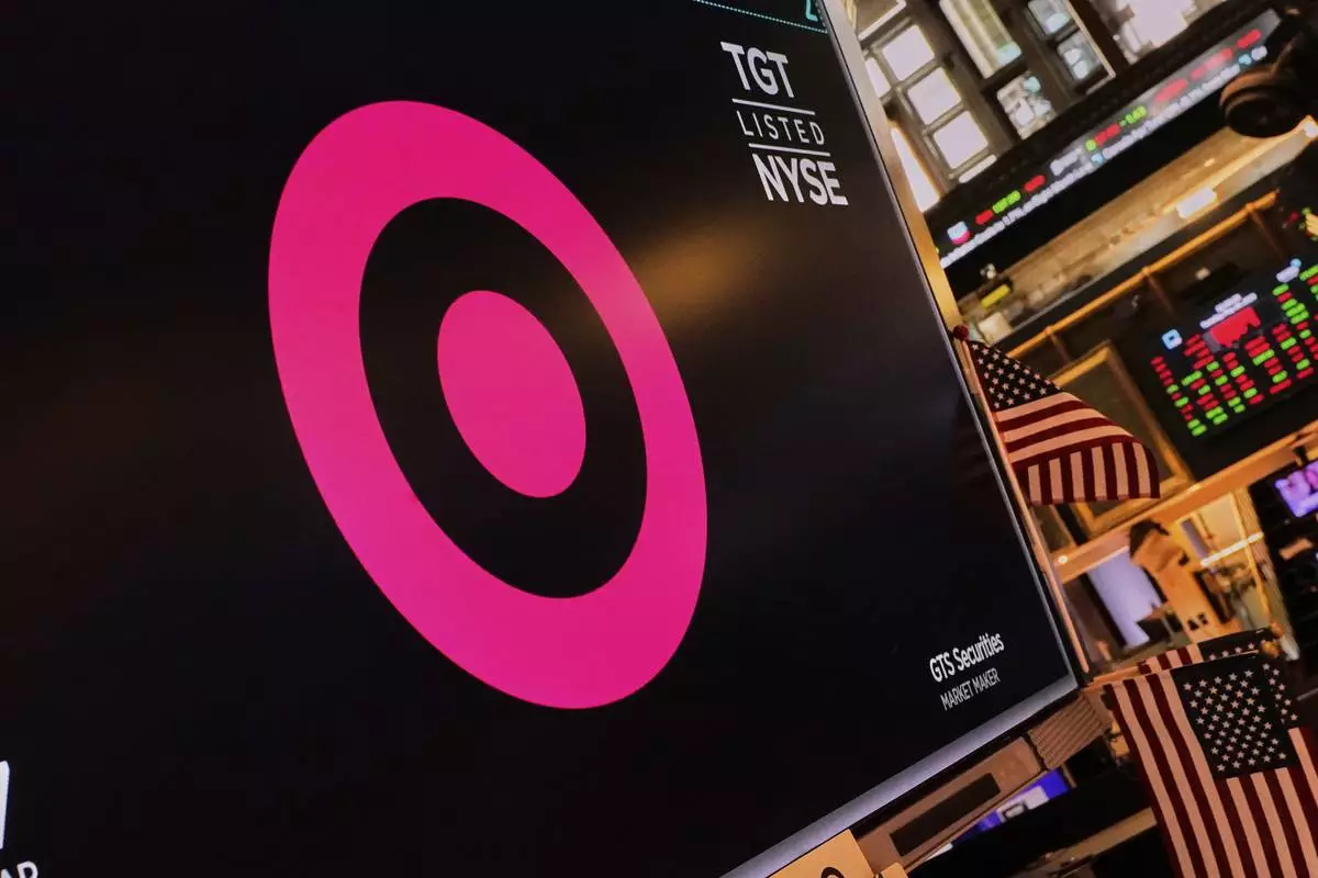 The logo for Target is displayed above a trading post on the floor of the New York Stock Exchange, Tuesday, May 20, 2025. (AP Photo/Richard Drew)