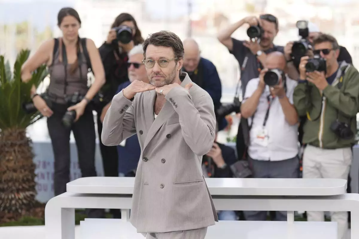 Joel Edgerton poses for photographers at the photo call for the film 'The Plague' at the 78th international film festival, Cannes, southern France, Friday, May 16, 2025. (AP Photo/Natacha Pisarenko)