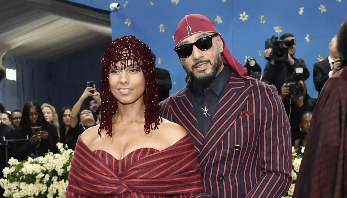 Alicia Keys, left, and Swizz Beatz attend The Metropolitan Museum of Art's Costume Institute benefit gala celebrating the opening of the "Superfine: Tailoring Black Style" exhibition on Monday, May 5, 2025, in New York. (Photo by Evan Agostini/Invision/AP)