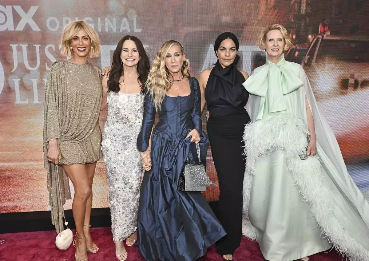 Nicole Ari Parker, from left, Kristin Davis, Sarah Jessica Parker, Sarita Choudhury and Cynthia Nixon pose together at the premiere of "And Just Like That..." Season 3 at the Crane Club on Wednesday, May 21, 2025, in New York. (Photo by Evan Agostini/Invision/AP)