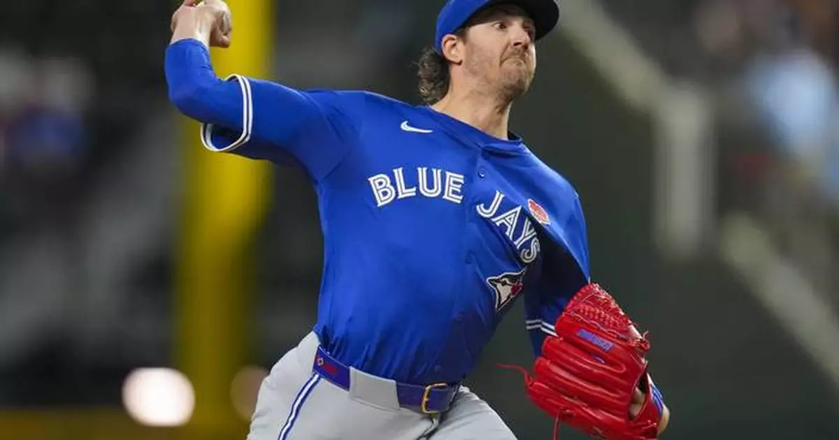 Gausman pitches 8 innings and Varsho homers as Blue Jays beat Rangers 2-1