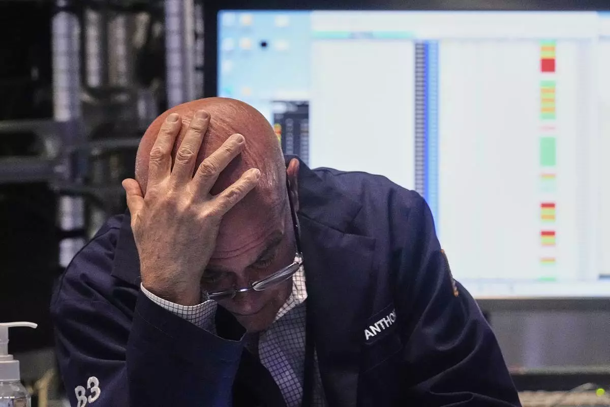 Trader Anthony Confusione works on the floor of the New York Stock Exchange, Monday, May 5, 2025. (AP Photo/Richard Drew)