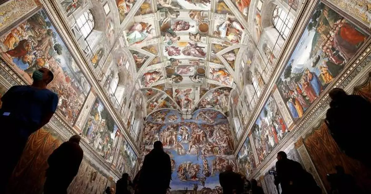 Vatican firefighters install a chimney on the roof of the Sistine Chapel for the papal election