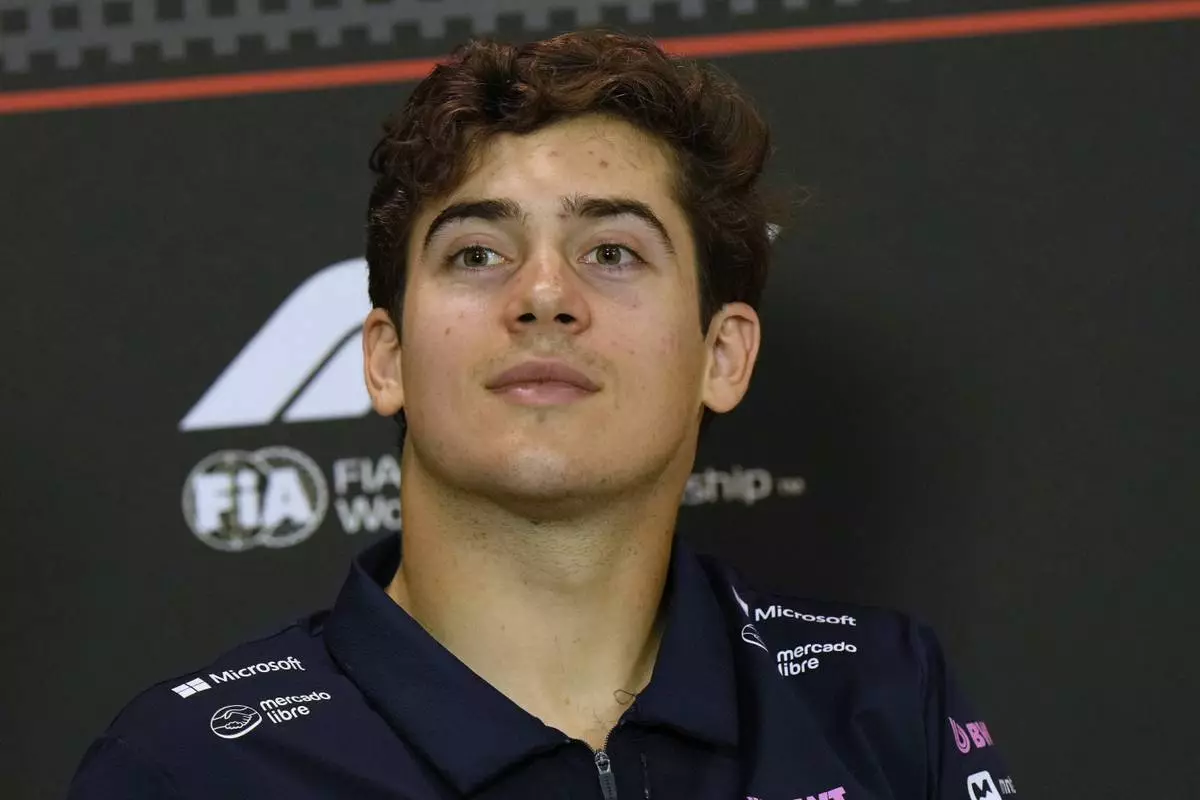 Alpine driver Franco Colapinto of Argentina answers reporters during a news conference at the Enzo and Dino Ferrari racetrack, ahead the Italy's Emilia Romagna Formula One Grand Prix in Imola, Italy, Thursday, May 15, 2025. (AP Photo/Luca Bruno)